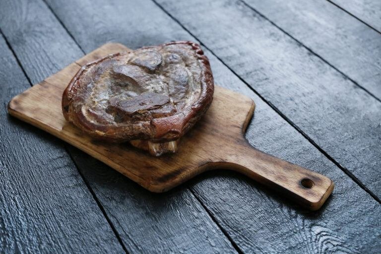 Seared steak on a wooden board